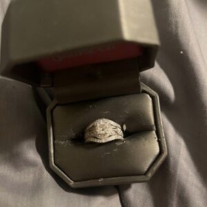 White gold engagement ring with 2 wedding bands